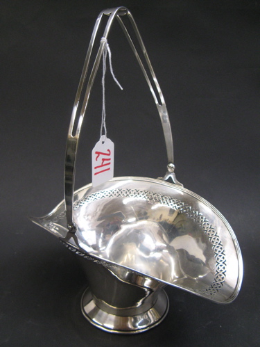 Appraisal: AN AMERICAN STERLING SILVER BOWL basket-form with pierced sides and