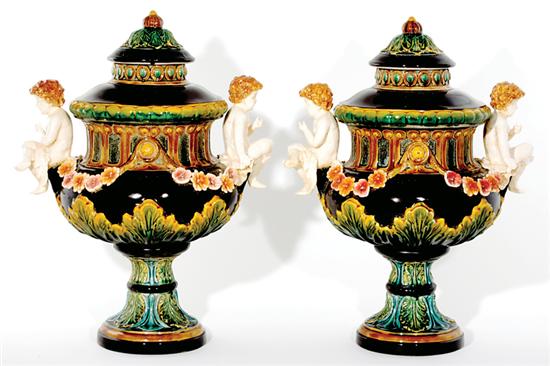 Appraisal: Massive pair majolica covered urns domed cover on baluster-form urn