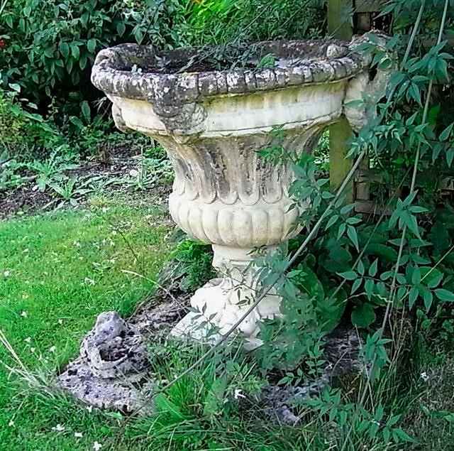 Appraisal: A PAIR OF CLASSICAL STYLE LARGE TWO HANDLED COMPOSITE URNS