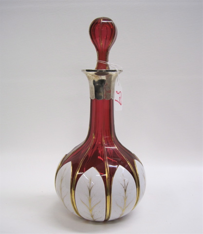 Appraisal: BOHEMIAN CRANBERRY GLASS DECANTER c overlay with white and gold