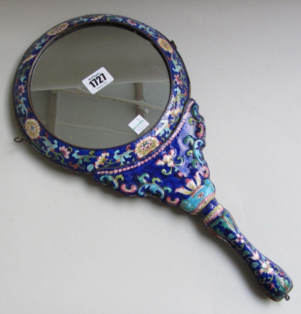 Appraisal: An enamel hand held dressing table mirror early th century