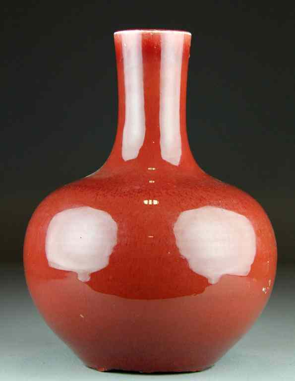 Appraisal: Chinese Strawberry Glaze Porcelain VaseBulbous vase with long neck ''H