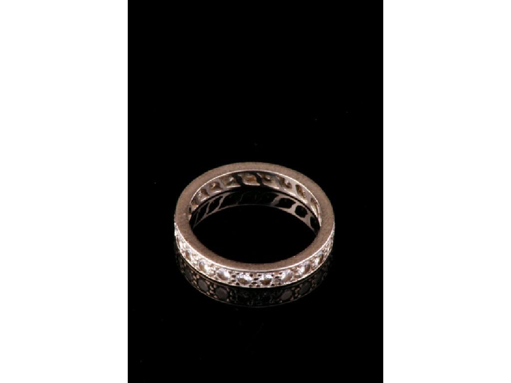 Appraisal: A FULL DIAMOND ETERNITY RING mille-grain set overall with round