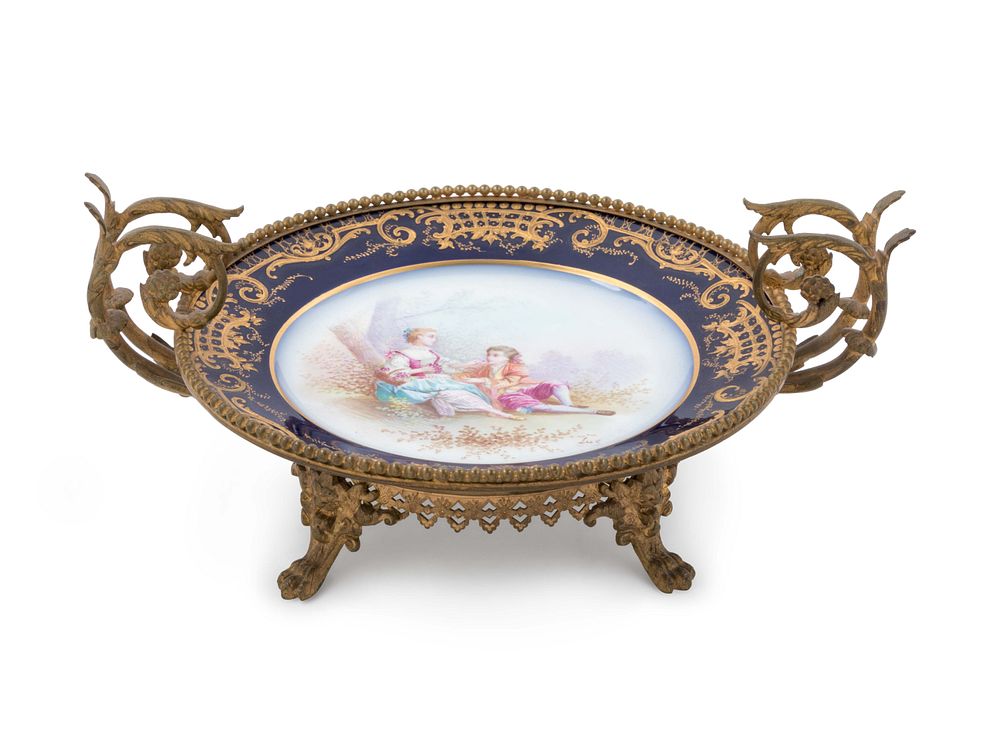 Appraisal: A Sevres Style Bronze Mounted Painted and Parcel Gilt Porcelain