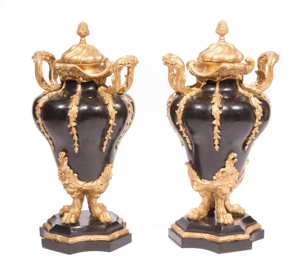 Appraisal: Pair of Italian Louis XV-Style Parcel Gilt Veneered Black Marble