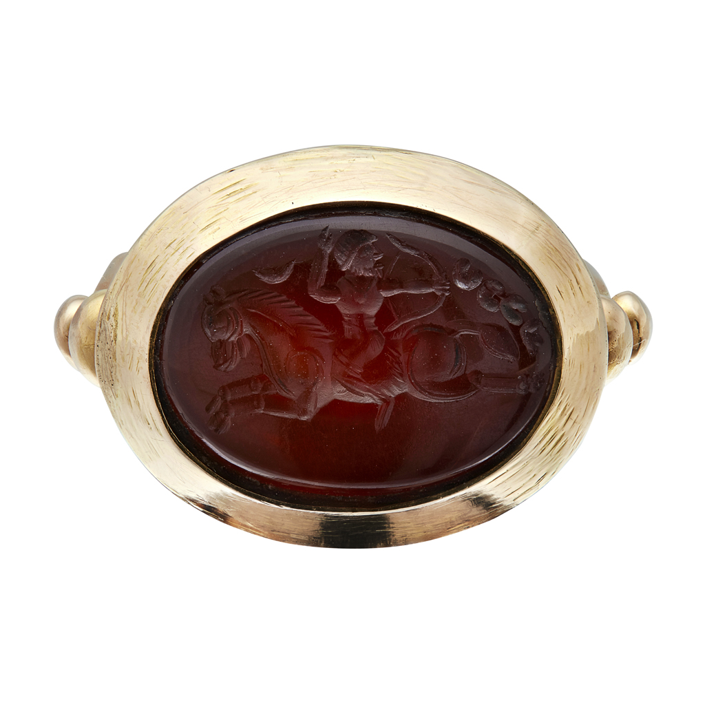 Appraisal: A gentleman's gold set intaglio ring the oval cornelian carved