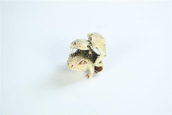 Appraisal: NETSUKE Japan th century ivory Frogs with green inked detail