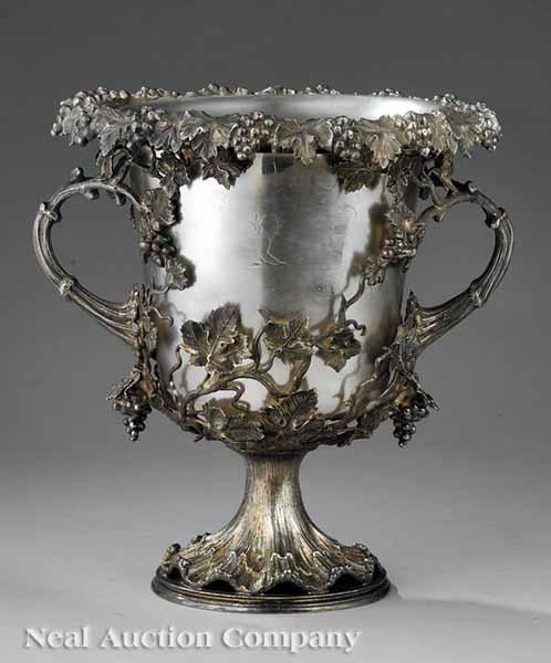 Appraisal: An English Vintage Motif Silverplate Wine Cooler cast two-handled openwork