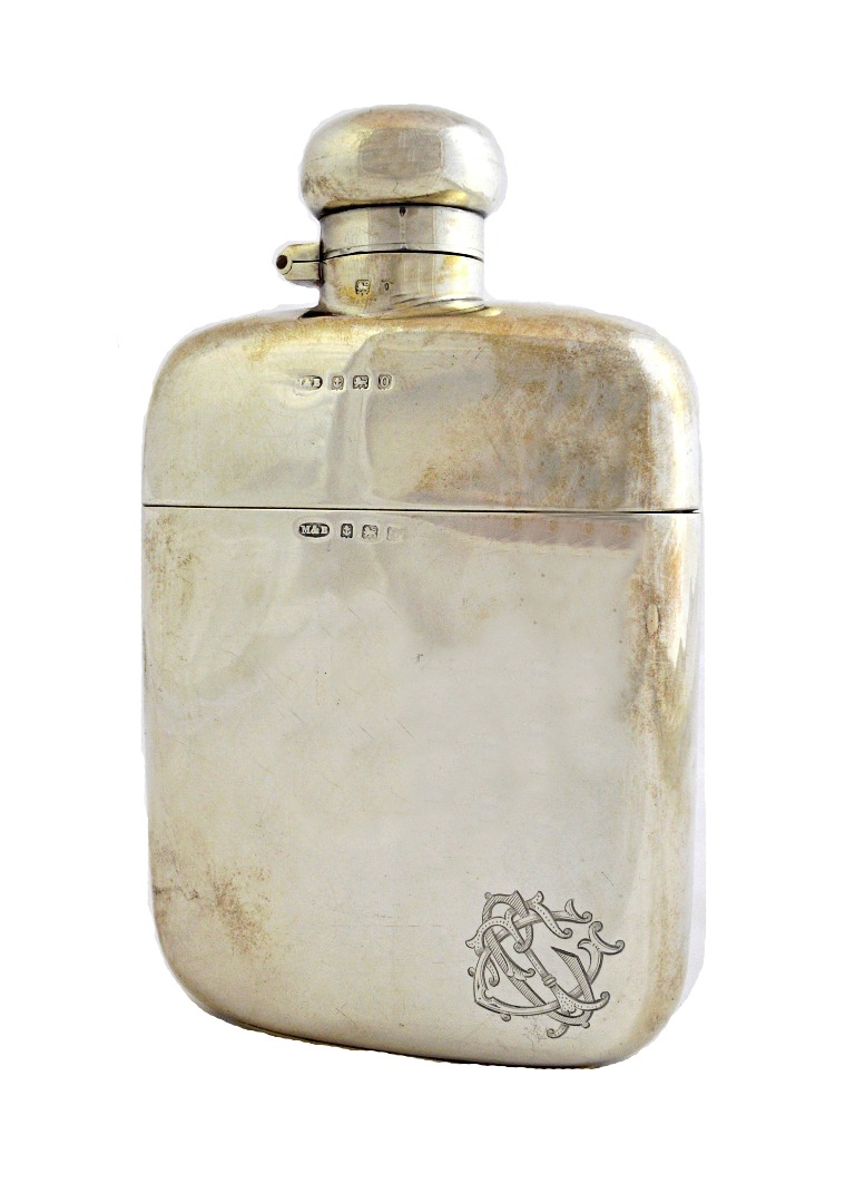 Appraisal: A silver hinge lidded spirit flask of curved rectangular form