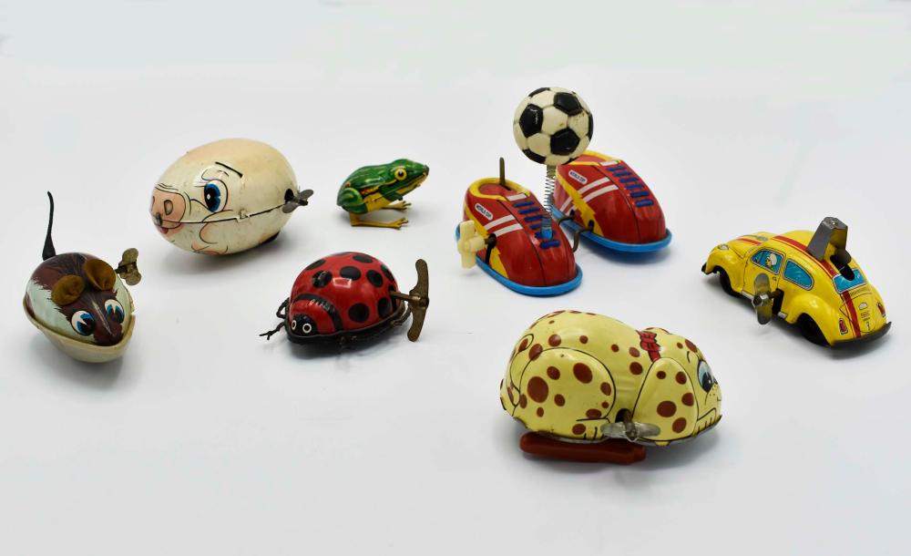 Appraisal: SEVEN VINTAGE VARIOUS PAINTED TIN WIND UP TOYS S to