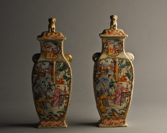 Appraisal: A Pair of Chinese Export Lidded Urns in a square