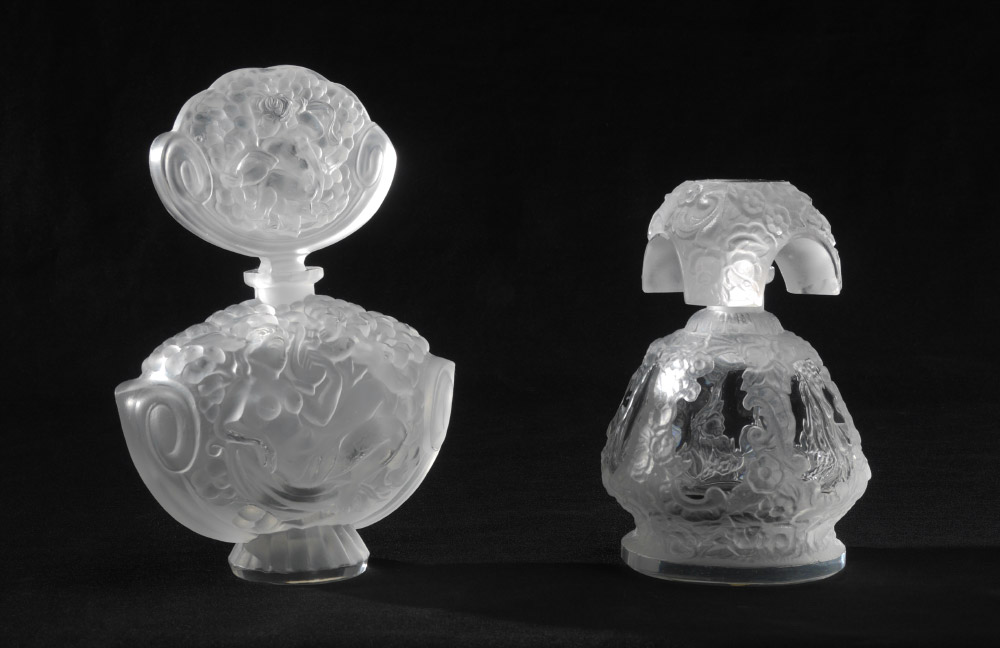 Appraisal: TWO CZECH GLASS PERFUME BOTTLES MARKED LALIQUE Each with spurious