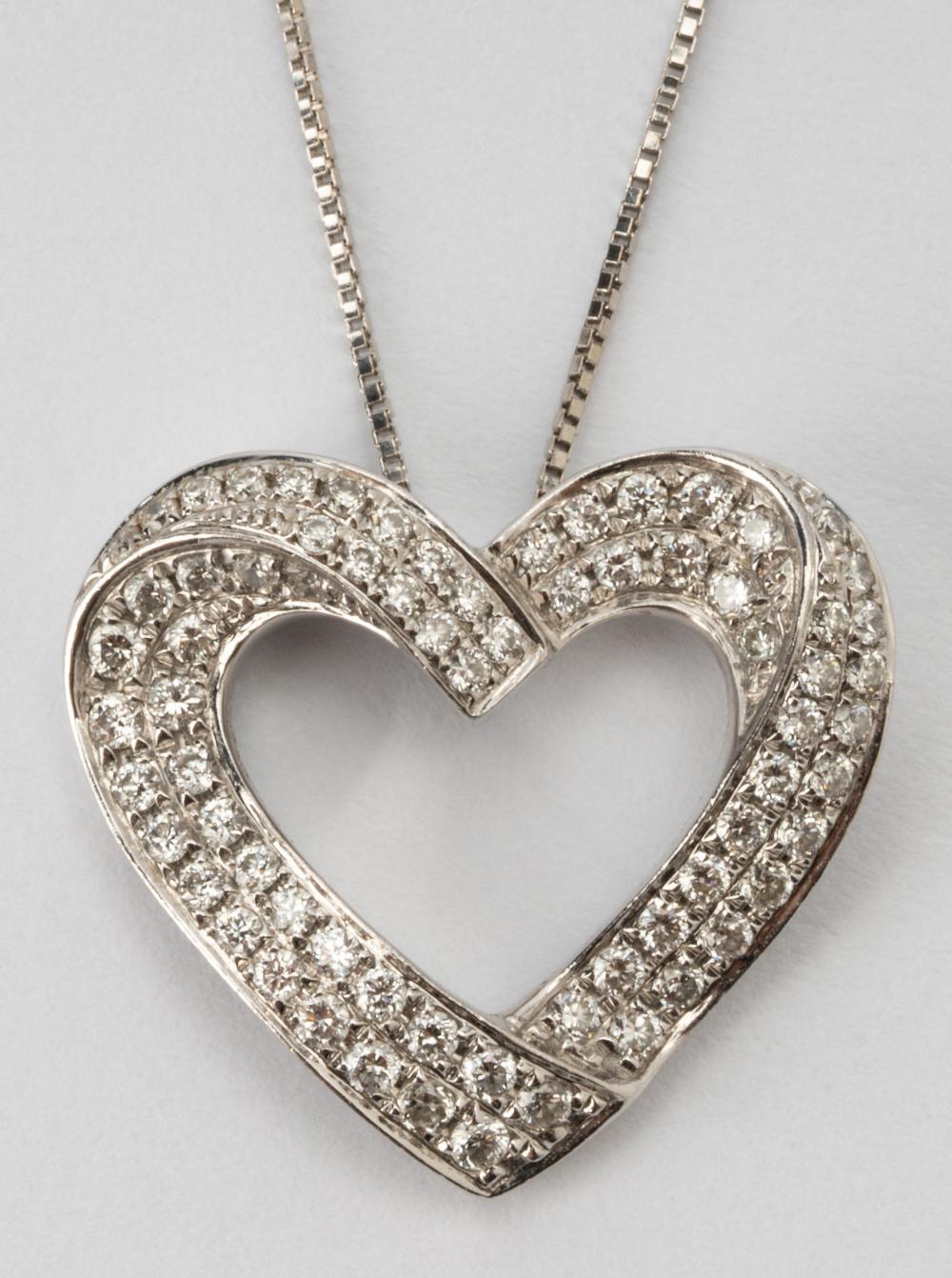 Appraisal: KARAT WHITE GOLD DIAMOND NECKLACEThe heart pendant is bead set