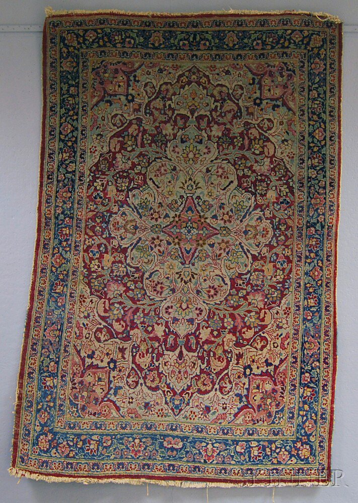 Appraisal: Kerman Rug Southeast Persia late th century end fraying selvage