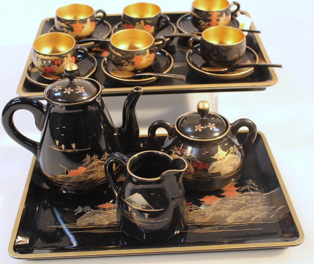 Appraisal: A thC oriental black lacquered part service to include coffee