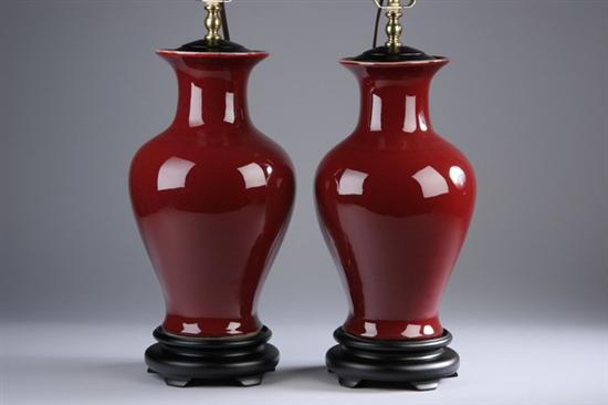 Appraisal: PAIR CHINESE COPPER RED PORCELAIN VASES Electrified - in high