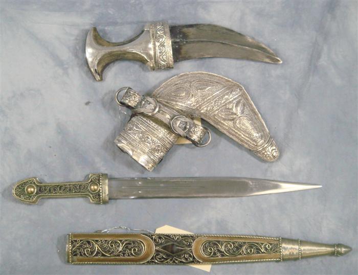 Appraisal: ornate African or Middle Eastern Tourist trade Daggers longest Estimate