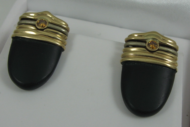 Appraisal: PAIR OF YELLOW DIAMOND AND BLACK ONYX EARRINGS each k