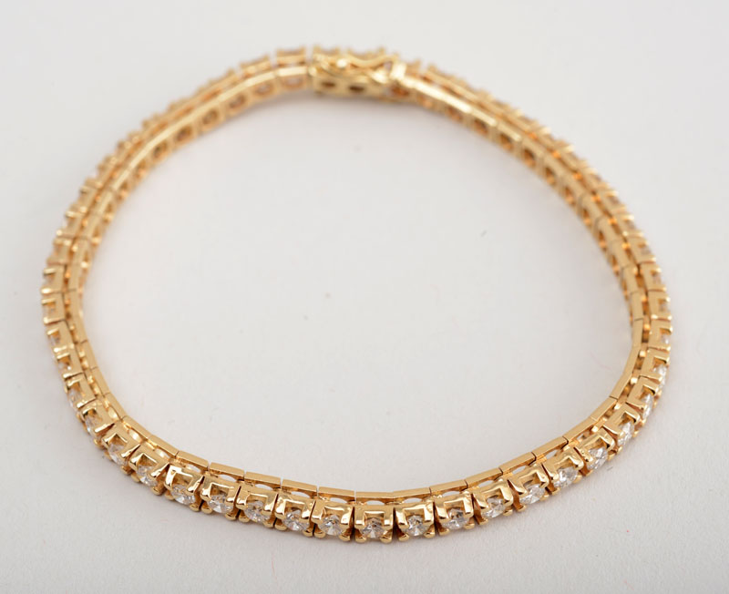 Appraisal: K YELLOW GOLD AND DIAMOND BRACELET Clasp stamped ' K