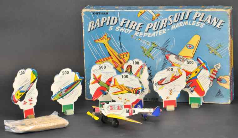 Appraisal: RAPID FIRE PURSUIT PLANE WITH BOX Gotham Set lithographed tin