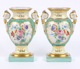 Appraisal: A pair of hand painted mantle urns gilt and floral