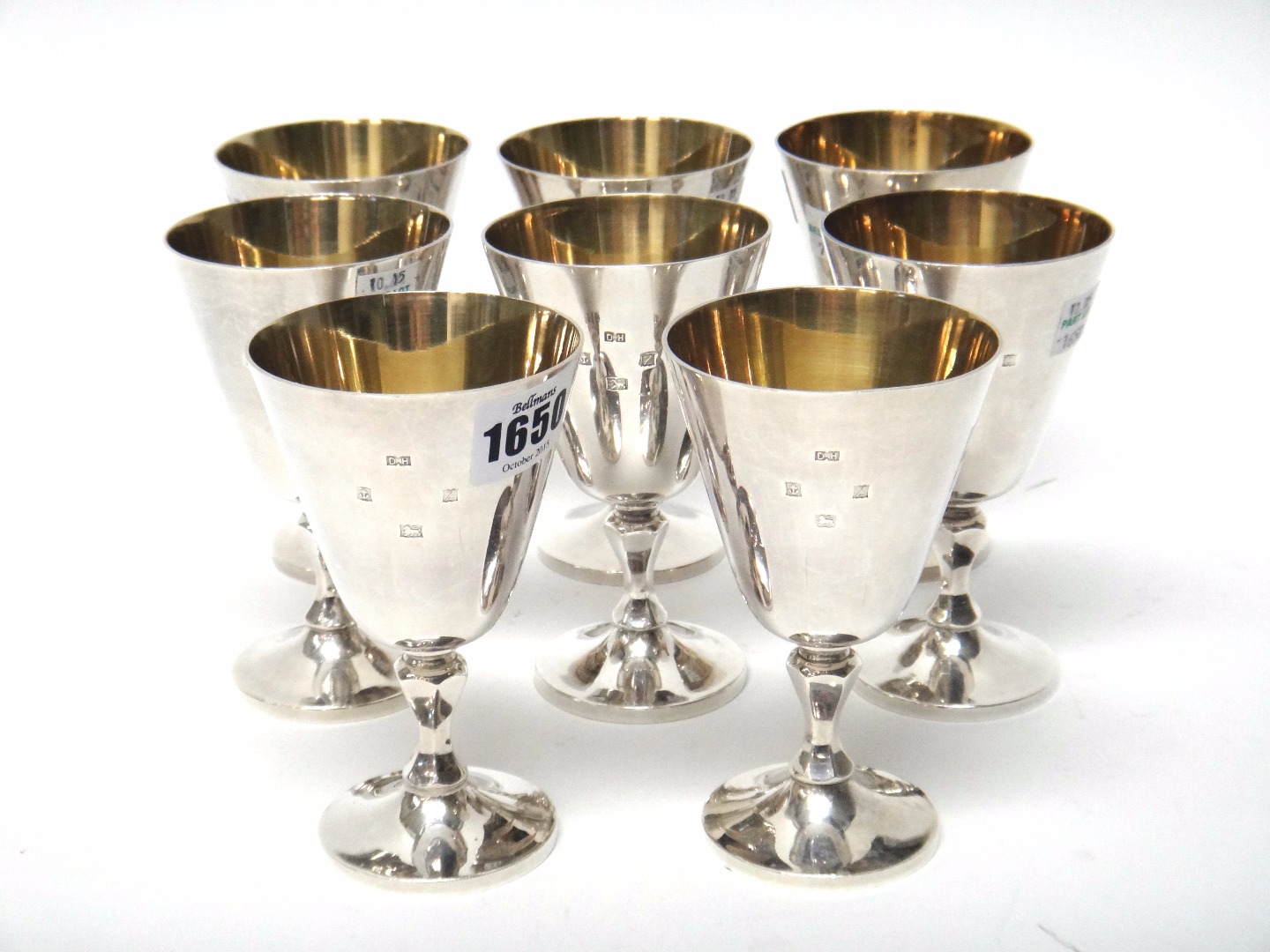 Appraisal: A set of eight silver wine goblets each with a