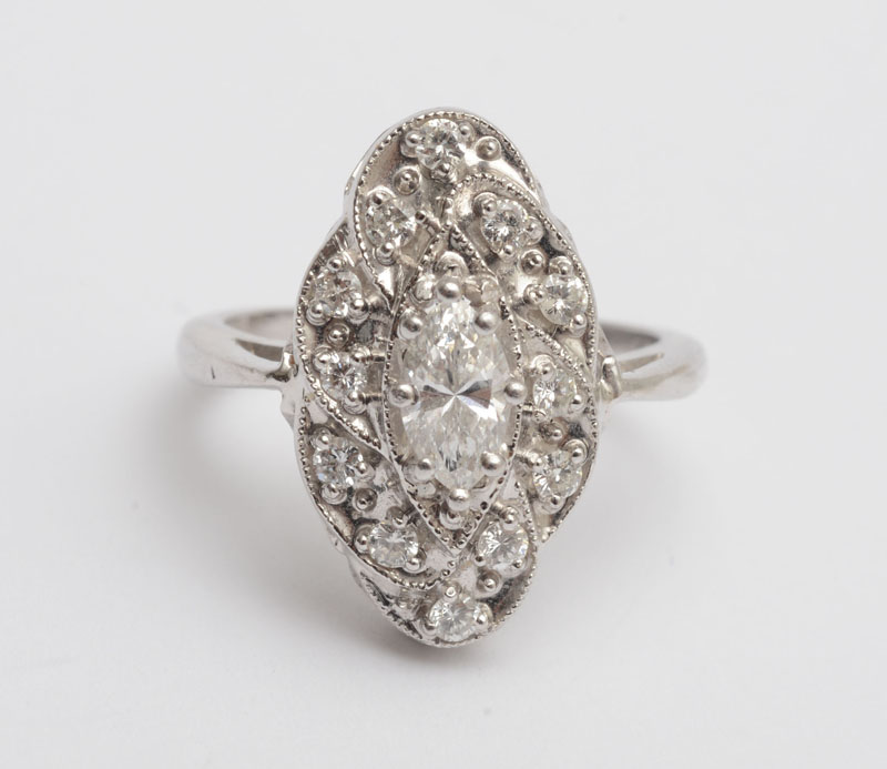 Appraisal: K WHITE GOLD AND DIAMOND NAVETTE FORM RING Contains a