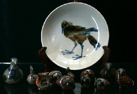 Appraisal: A collection of polychrome painted teracotta figures of birds together