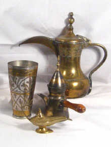 Appraisal: Brassware A traditional Turkish covered coffee pot cm high with