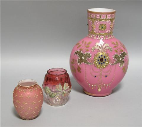 Appraisal: LARGE JEWELED AND GILDED PINK CASED GLASS VASE With elaborate