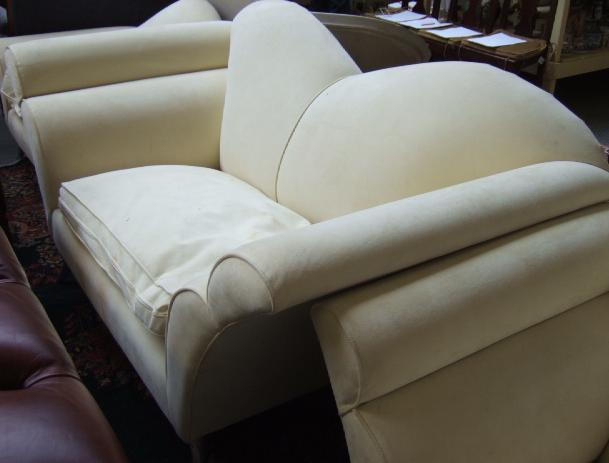 Appraisal: An Intermura double hump back sofa upholstered in ivory alcantara