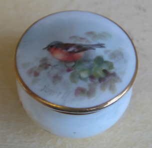 Appraisal: A Royal Worcester porcelain rouge pot and cover of circular