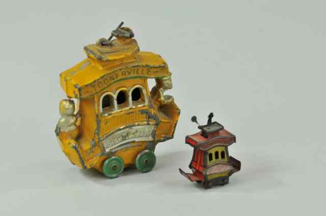 Appraisal: TOONERVILLE TROLLEYS Includes two examples a lithographed tin Cracker Jack