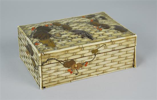 Appraisal: JAPANESE IVORY BASKETWOVEN COVERED BOX with applied butterfly and leaf