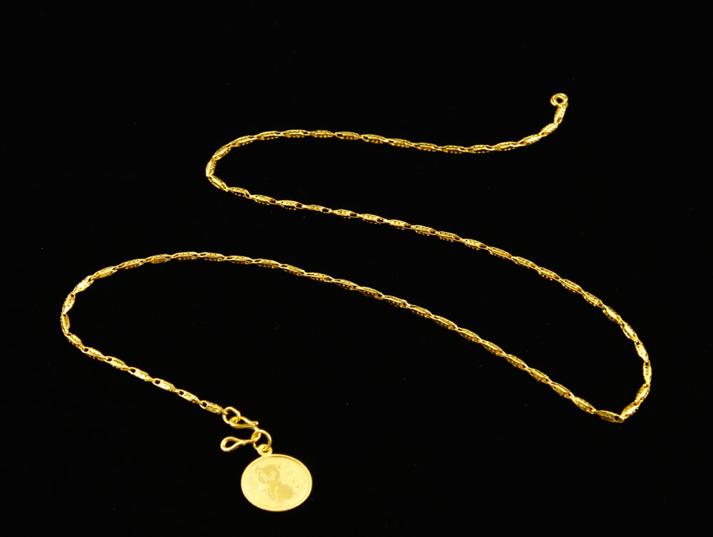 Appraisal: - K Yellow Gold Necklace and Coin Pendant K yellow