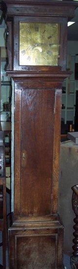 Appraisal: An oak cased thirty-hour longcase clock the brass dial signed