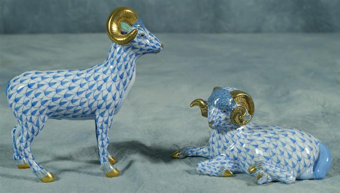 Appraisal: Herend fishnet figurines two blue rams long no damage Estimate