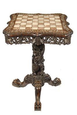 Appraisal: A Chinese carved hardwood games table the top inset a