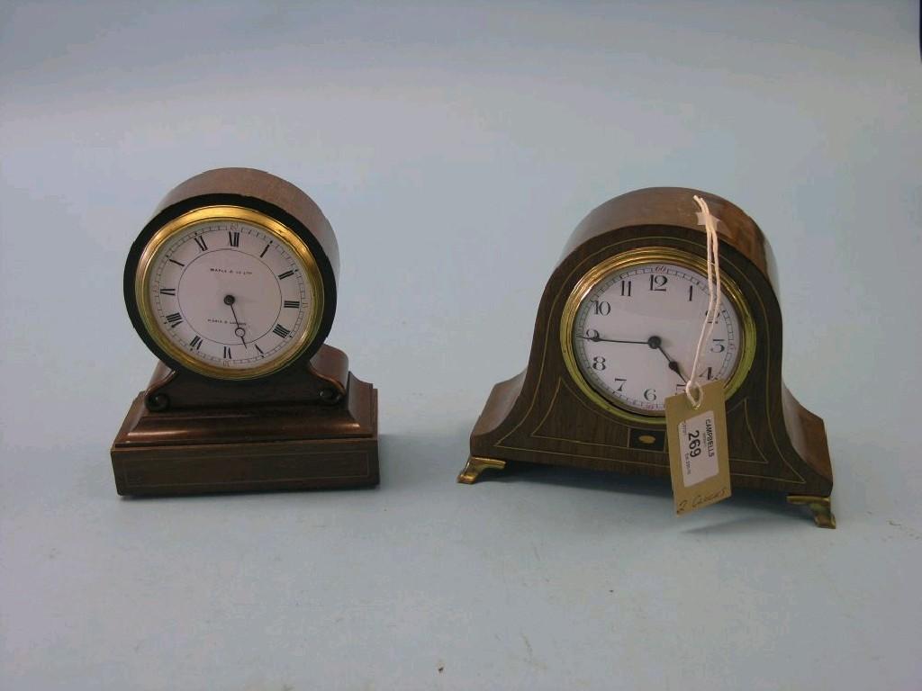 Appraisal: An inlaid mahogany mantel clock dome-shape with convex enamel dial