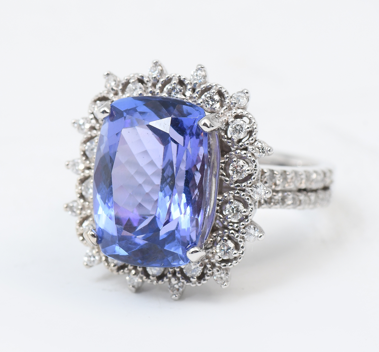 Appraisal: K CT TANZANITE DIAMOND RING CT cushion cut tanzanite is