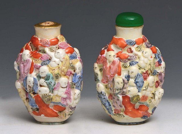 Appraisal: TWO CHINESE SNUFF BOTTLES each with raised polychrome scholars one