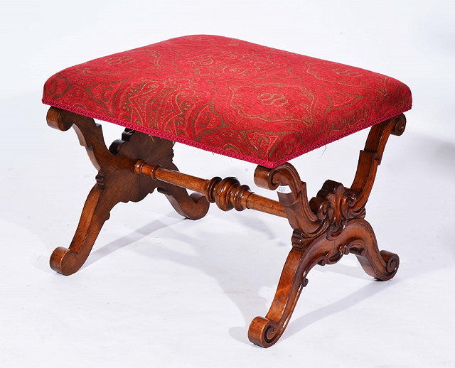 Appraisal: A VICTORIAN WALNUT DRESSING STOOL with carved 'X' frame supports