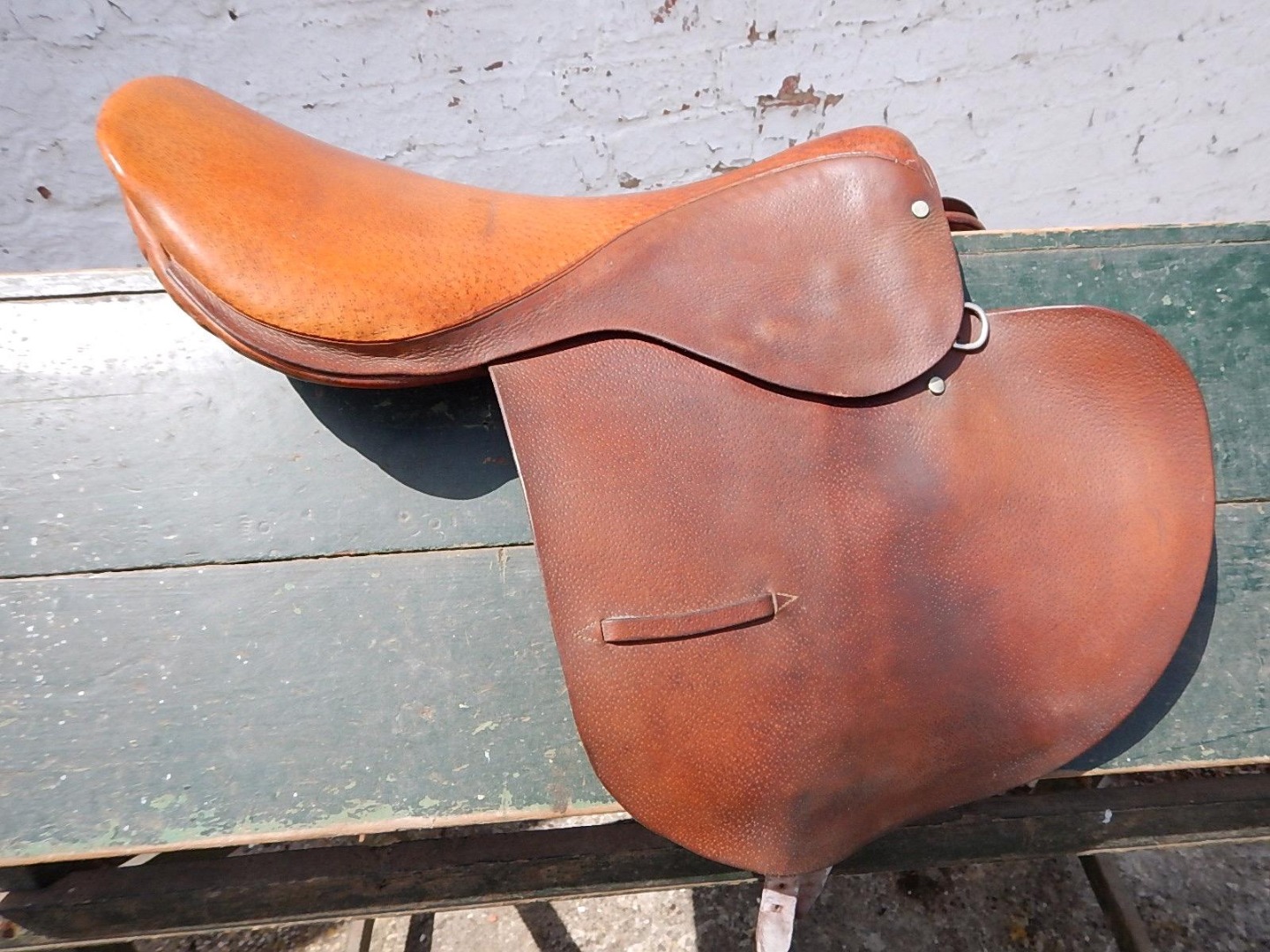 Appraisal: A vintage racing or exercise leather saddle by Gibson of