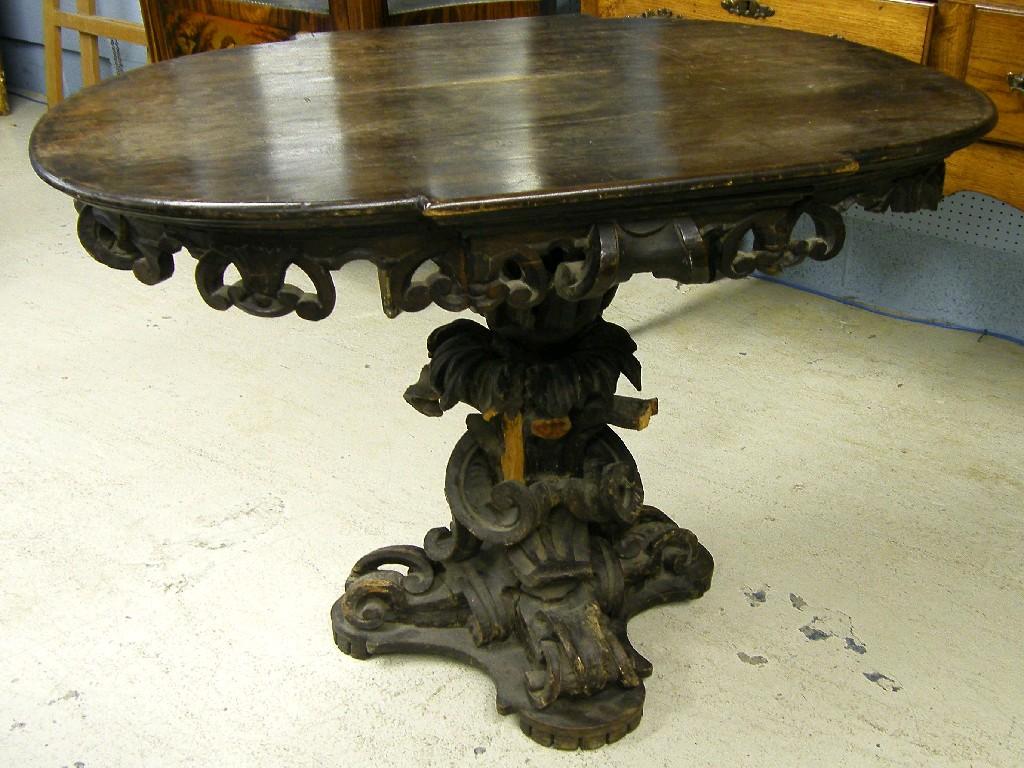 Appraisal: Antique Gothic elm oval pedestal side table upon pierced carved