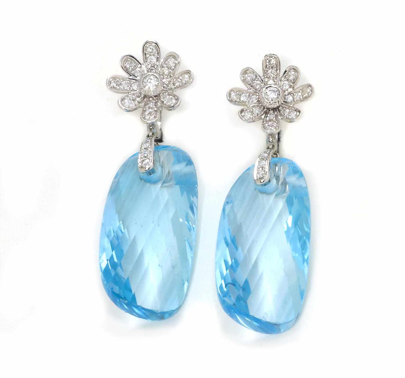 Appraisal: A pair of blue topaz and diamond pendant earrings fancy-cut