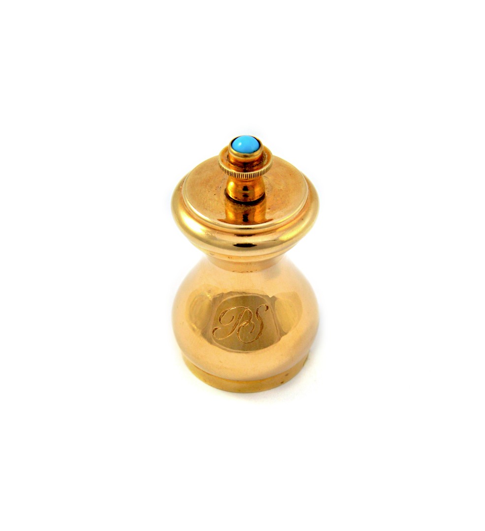 Appraisal: A ct gold cased peppermill of capstan shaped form with