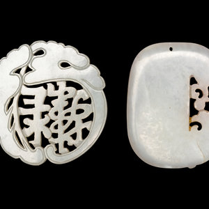 Appraisal: Two Chinese Pale Celadon Jade Pendants the first of carved