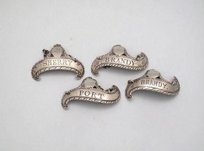 Appraisal: Four George III silver wine labels by Hester Bateman circa