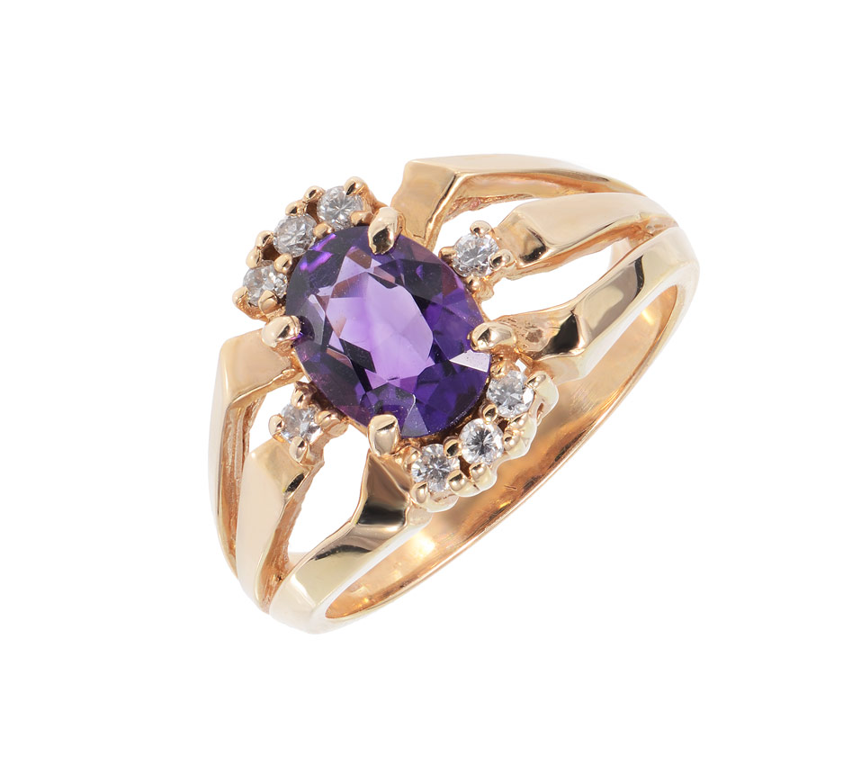 Appraisal: AMETHYST AND DIAMOND FASHION RING K yellow gold ring centers