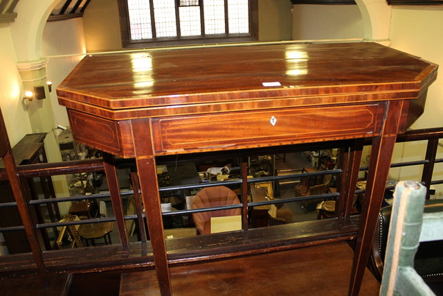 Appraisal: A TH CENTURY FOLD-OVER TOP TEA TABLE of canted form